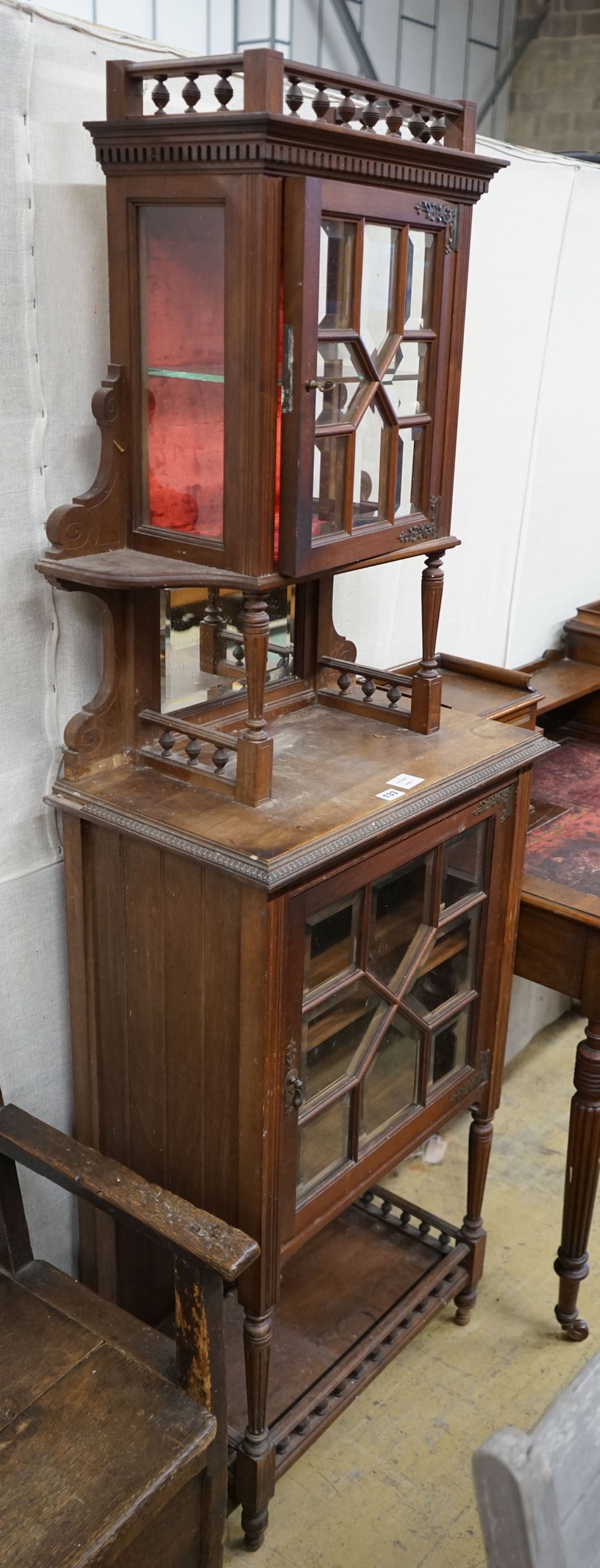 A late Victorian narrow mahogany display cabinet, width 60cm, depth 35cm, height 178cm